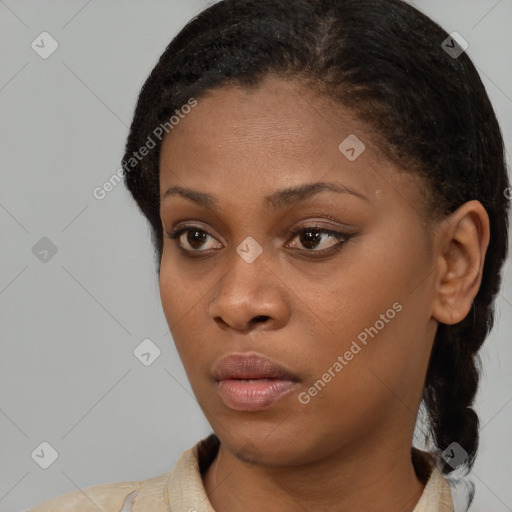 Neutral black young-adult female with short  brown hair and brown eyes