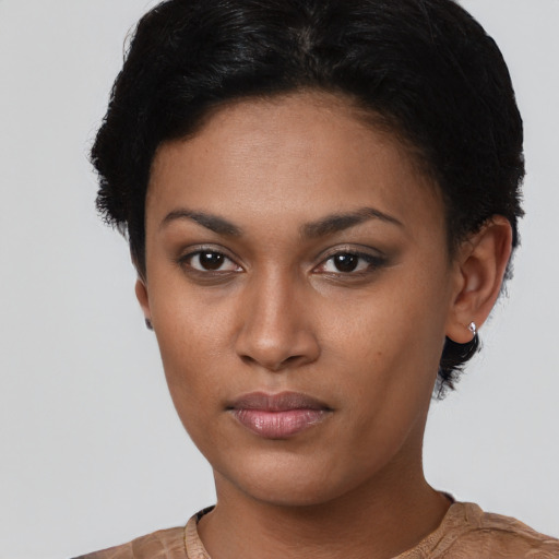 Neutral latino young-adult female with short  black hair and brown eyes