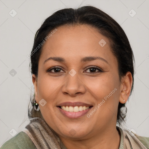 Joyful latino young-adult female with medium  brown hair and brown eyes