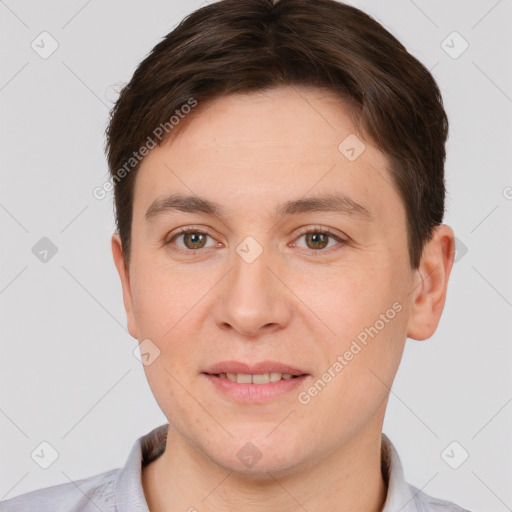 Joyful white young-adult male with short  brown hair and brown eyes