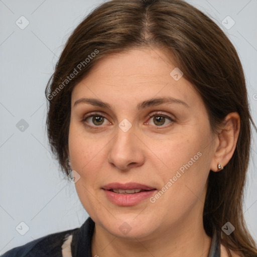 Joyful white adult female with medium  brown hair and brown eyes