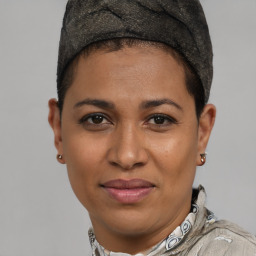 Joyful white adult female with short  brown hair and brown eyes