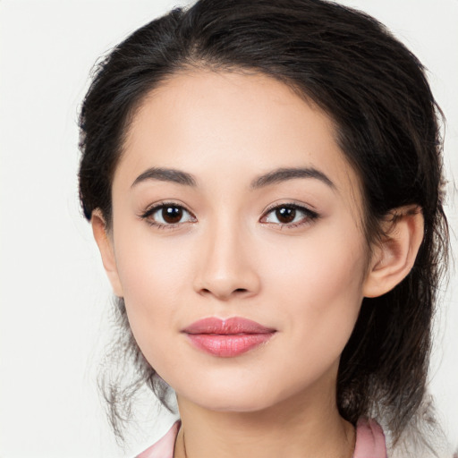 Joyful white young-adult female with medium  black hair and brown eyes