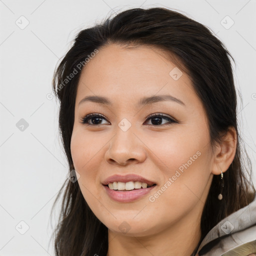 Joyful white young-adult female with long  brown hair and brown eyes