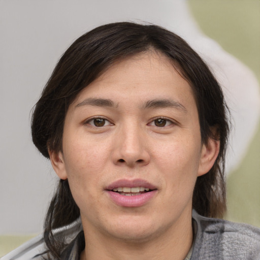 Joyful white young-adult male with medium  brown hair and brown eyes