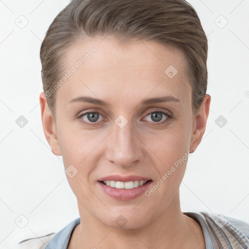 Joyful white young-adult female with short  brown hair and grey eyes