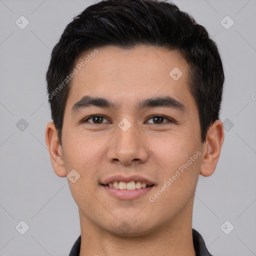 Joyful asian young-adult male with short  black hair and brown eyes