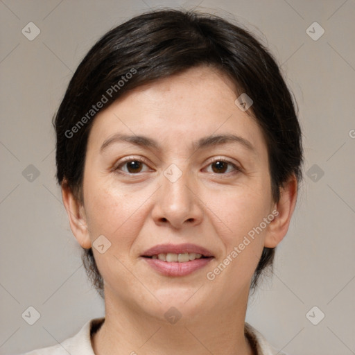 Joyful white adult female with medium  brown hair and brown eyes