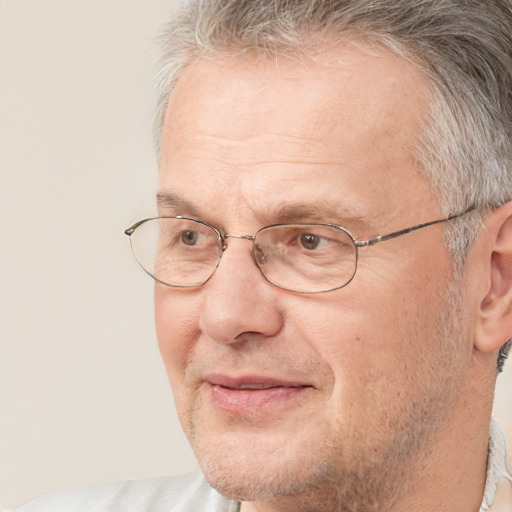 Joyful white middle-aged male with short  brown hair and brown eyes