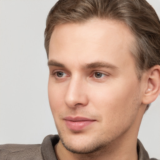 Neutral white young-adult male with short  brown hair and grey eyes