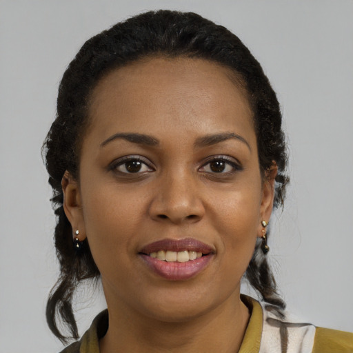 Joyful black young-adult female with medium  black hair and brown eyes