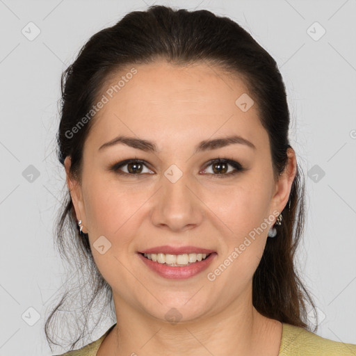 Joyful white young-adult female with medium  brown hair and brown eyes