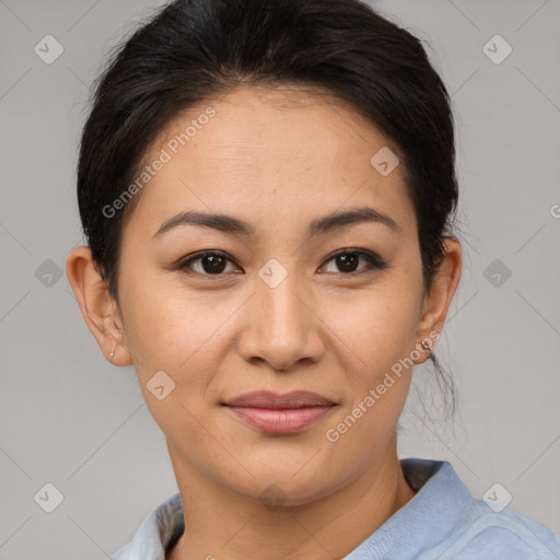 Joyful asian young-adult female with short  brown hair and brown eyes