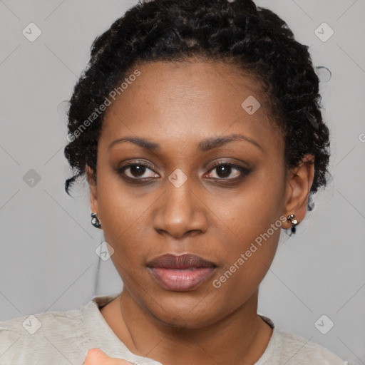 Neutral black young-adult female with short  brown hair and brown eyes