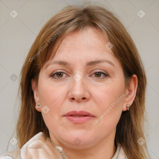 Joyful white adult female with medium  brown hair and brown eyes