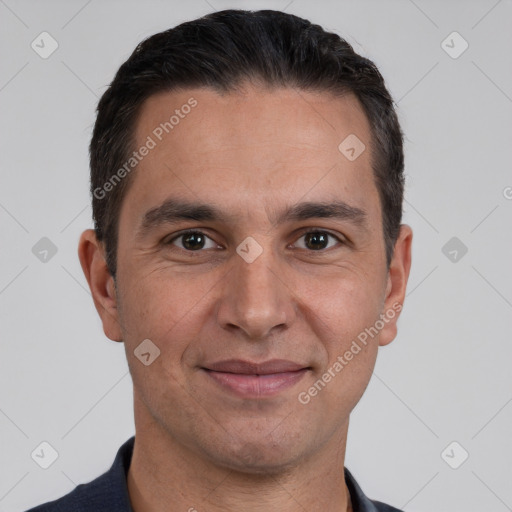 Joyful white adult male with short  brown hair and brown eyes