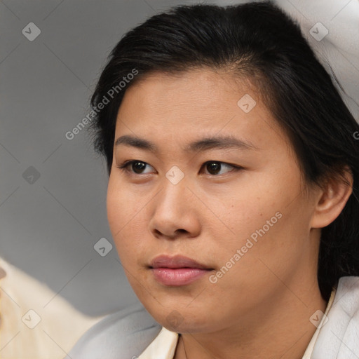 Neutral asian young-adult female with medium  brown hair and brown eyes