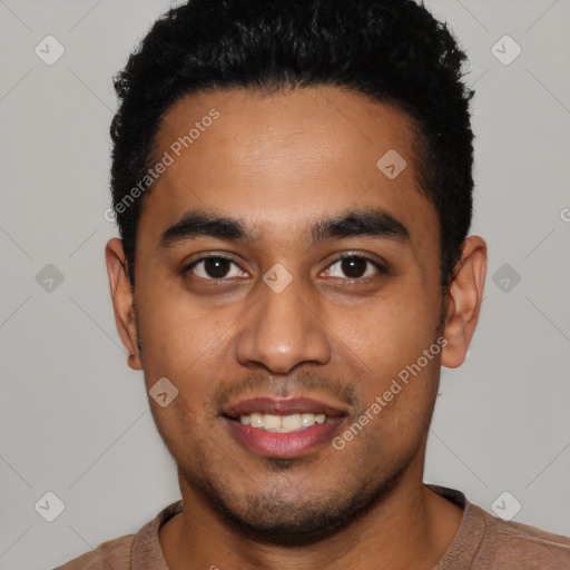 Joyful latino young-adult male with short  black hair and brown eyes