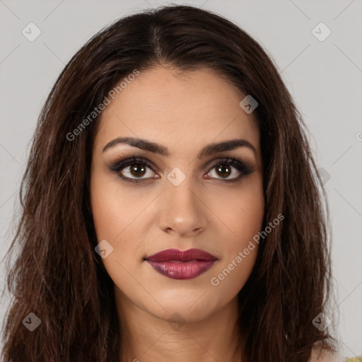 Joyful white young-adult female with long  brown hair and brown eyes