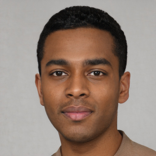 Neutral black young-adult male with short  black hair and brown eyes