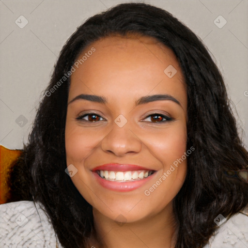 Joyful latino young-adult female with long  black hair and brown eyes