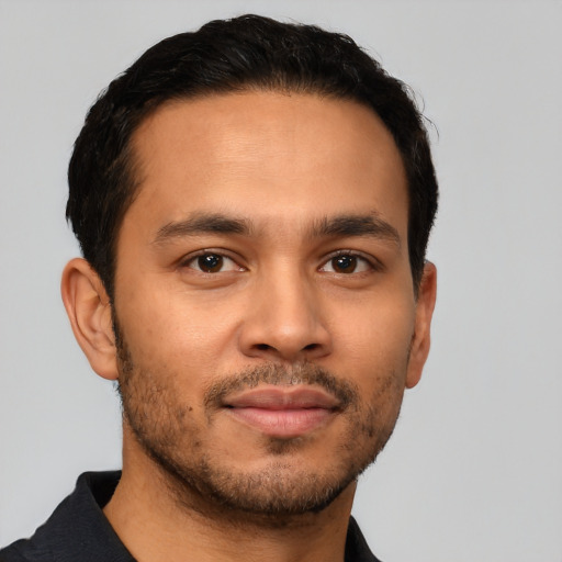 Neutral latino young-adult male with short  brown hair and brown eyes