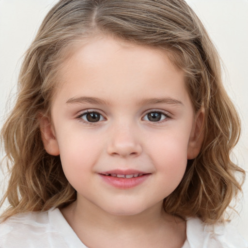 Joyful white child female with medium  brown hair and grey eyes