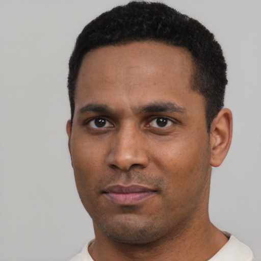 Neutral black young-adult male with short  black hair and brown eyes