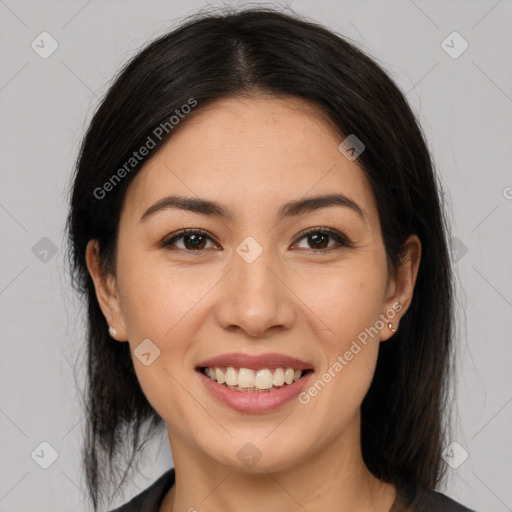 Joyful latino young-adult female with medium  brown hair and brown eyes