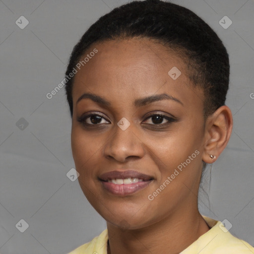 Joyful black young-adult female with short  brown hair and brown eyes