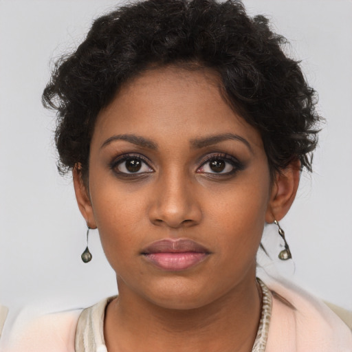 Neutral black young-adult female with short  brown hair and brown eyes