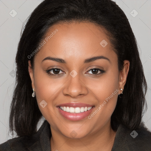 Joyful latino young-adult female with long  brown hair and brown eyes