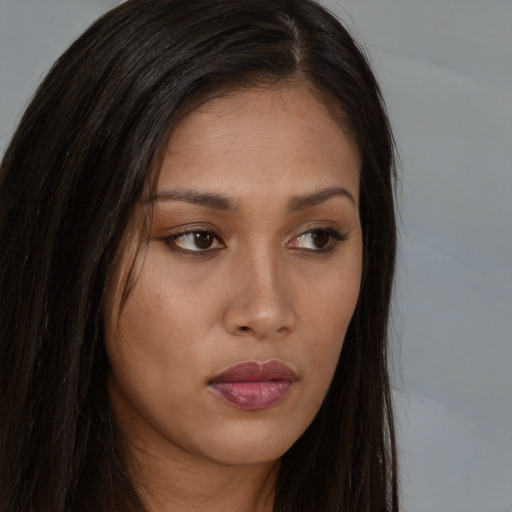 Neutral asian young-adult female with long  brown hair and brown eyes