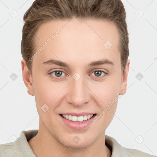 Joyful white young-adult female with short  brown hair and grey eyes