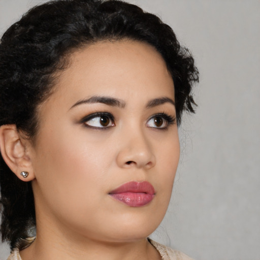 Neutral latino young-adult female with medium  black hair and brown eyes