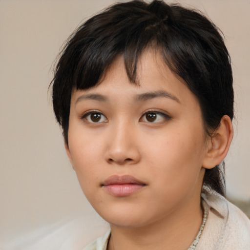 Neutral asian young-adult female with medium  black hair and brown eyes