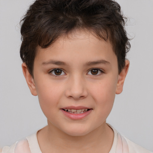 Joyful white child female with short  brown hair and brown eyes