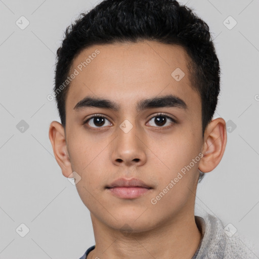 Neutral latino young-adult male with short  black hair and brown eyes