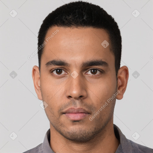 Neutral latino young-adult male with short  black hair and brown eyes