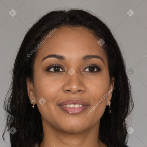 Joyful black young-adult female with long  brown hair and brown eyes