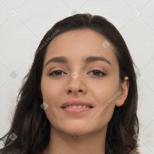 Joyful white young-adult female with long  black hair and brown eyes