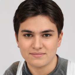 Joyful white young-adult male with medium  brown hair and brown eyes