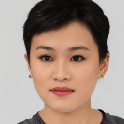 Neutral asian young-adult female with medium  black hair and brown eyes