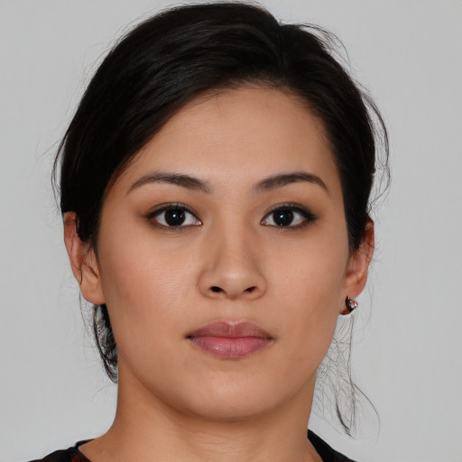 Neutral asian young-adult female with medium  brown hair and brown eyes