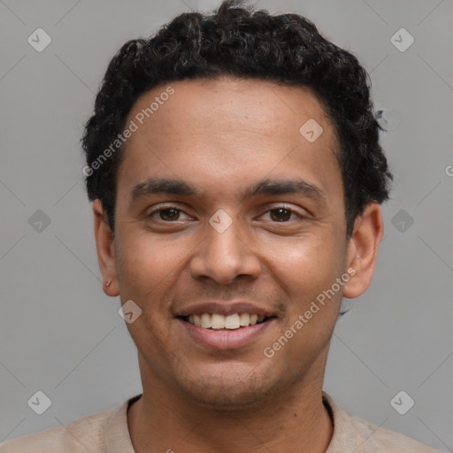 Joyful latino young-adult male with short  brown hair and brown eyes