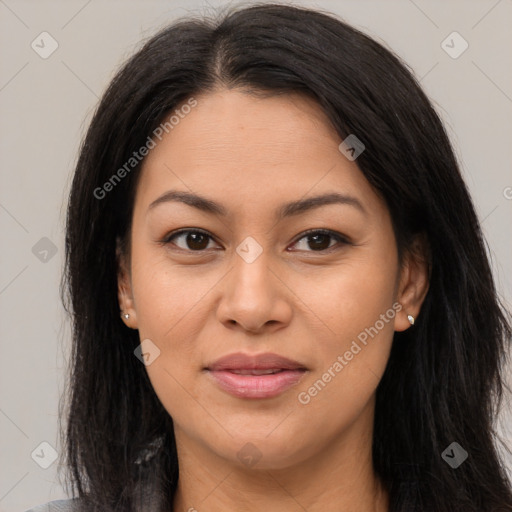 Joyful latino young-adult female with long  brown hair and brown eyes