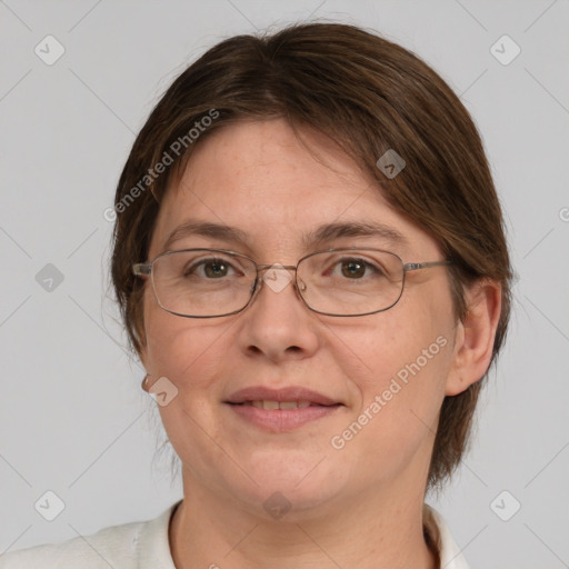 Joyful white adult female with medium  brown hair and grey eyes