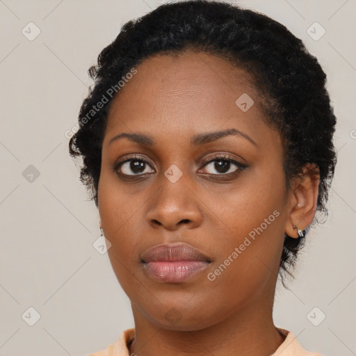 Neutral black young-adult female with short  black hair and brown eyes