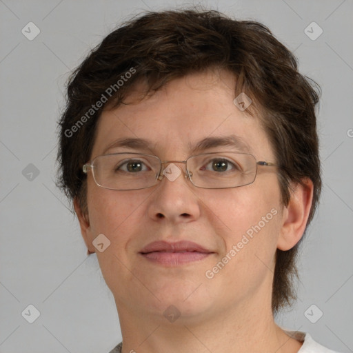 Joyful white adult female with short  brown hair and brown eyes