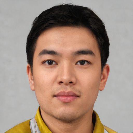 Neutral asian young-adult male with short  black hair and brown eyes